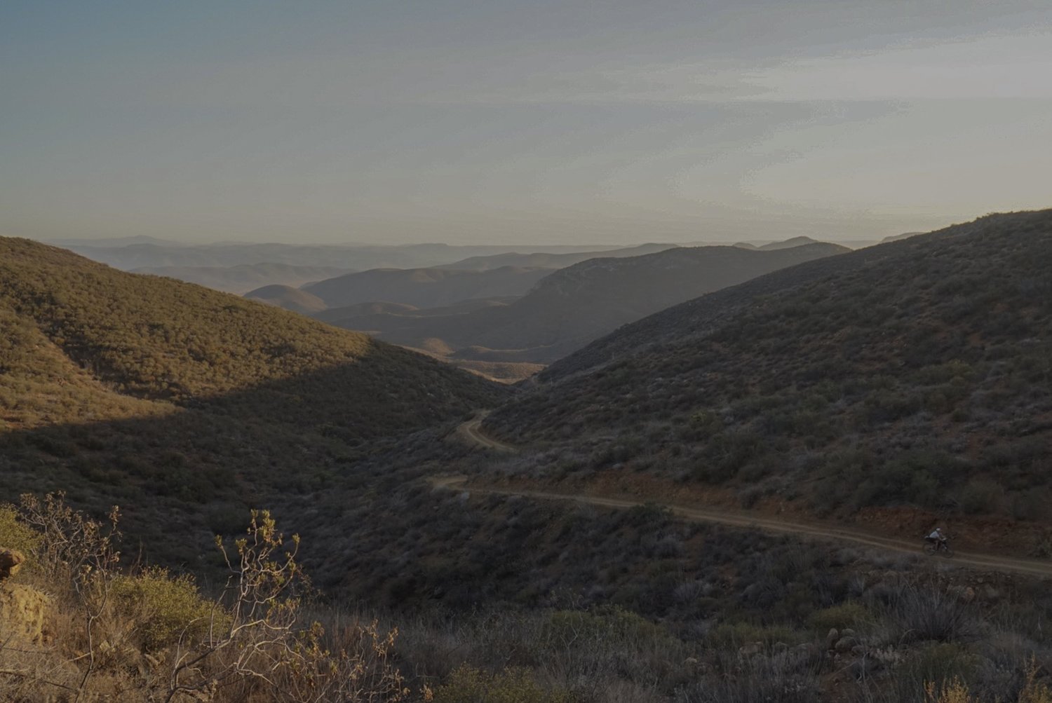 Caitlin climbing in Baja