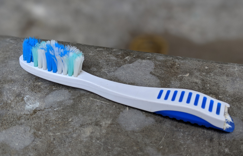 Half of a toothbrush
